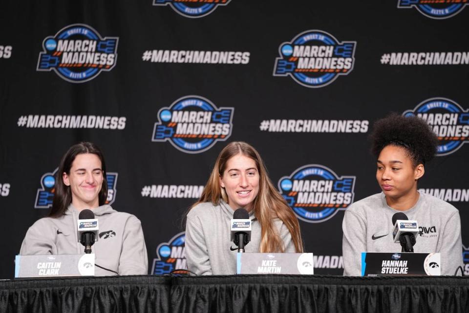 Iowa Hawkeyes guard Caitlin Clark, guard Kate Martin, and forward Hannah Stuelke take questions from the media at MVP Arena, Sunday, March 31, 2024 in Albany, N.Y.