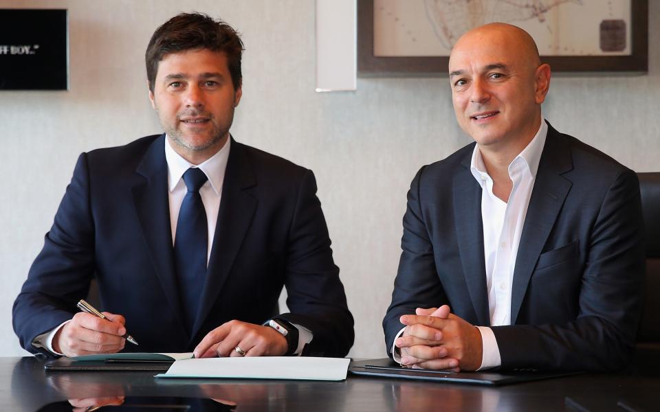 Mauricio Pochettino, Manager of Tottenham Hotspur (L) poses with Chairman Daniel Levy after signing a new contract until 2021 - Getty Images