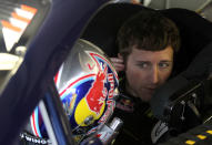 LOUDON, NH - SEPTEMBER 24: Kasey Kahne, driver of the #4 Red Bull Toyota, adjusts his ear piece as he sits in his car during practice for the NASCAR Sprint Cup Series Sylvania 300 at New Hampshire Motor Speedway on September 24, 2011 in Loudon, New Hampshire. (Photo by Tom Whitmore/Getty Images for NASCAR)