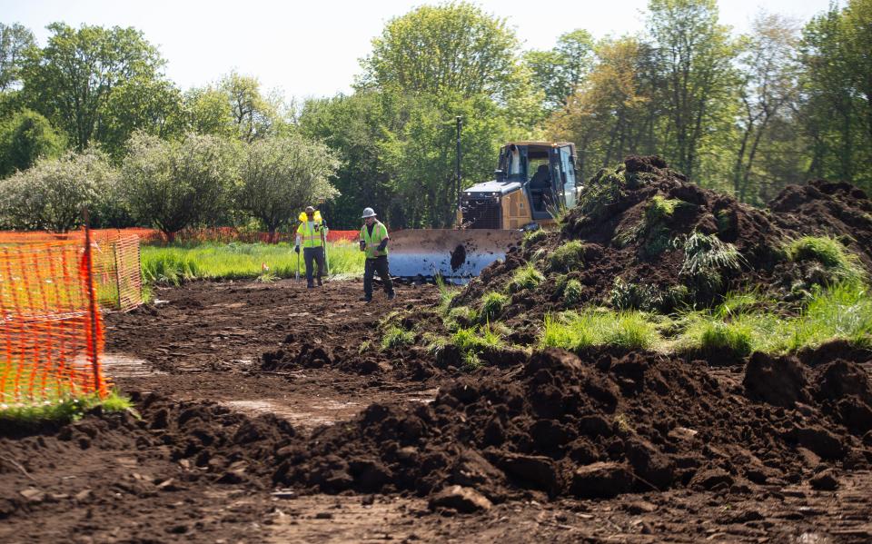 Crews begin clearing top soil for construction of the Santa Clara Community Park on River Loop 2 in Eugene.