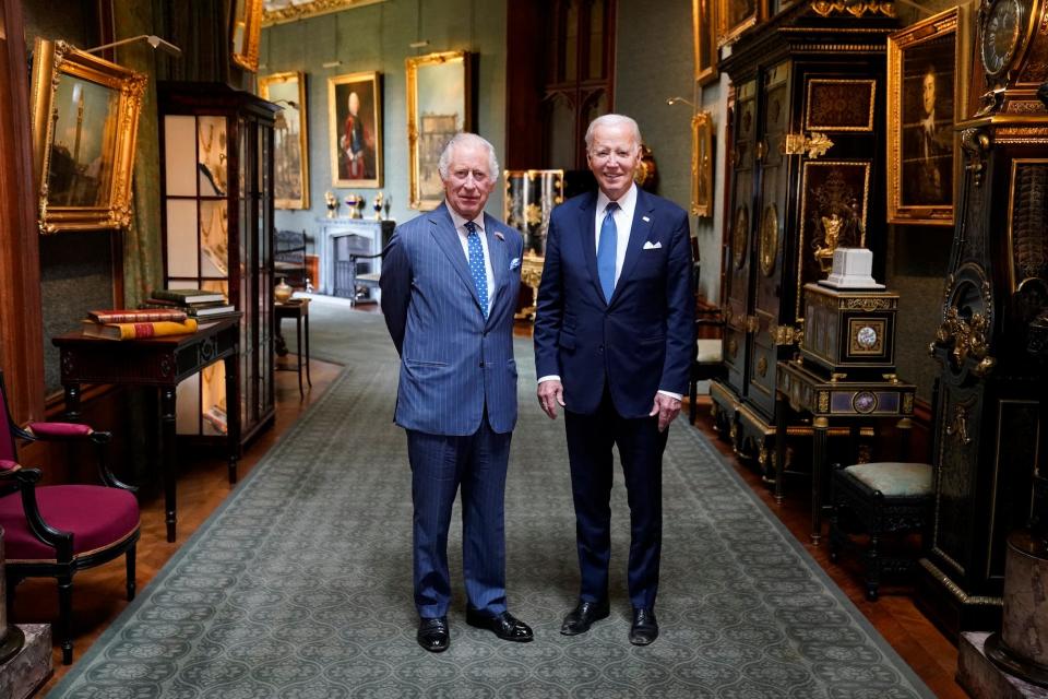 King Charles III and President Joe Biden pose in Windsor Castle in July 2023.