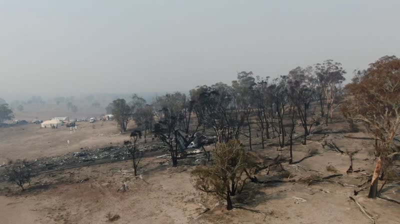 The site of the crash of a C-130 air tanker plane after dropping fire retardant, in this January 24, 2020 still frame obtained from social media video, in Snowy Mountains, New South Wales, Australia