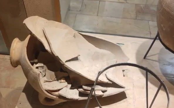 The four-year-old boy accidentally smashed the 3,500 year old vase after pulling it 'slightly'