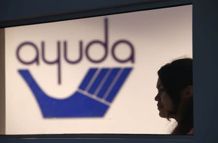 Honduran immigrant teen identifying herself as Suyen G. poses during an interview at the Ayuda office in Falls Church, Virginia May 19, 2014. 2014. REUTERS/Kevin Lamarque