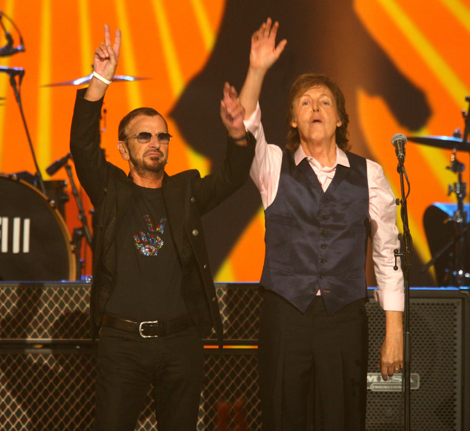 Ringo Starr and Paul McCartney perform at The Night that Changed America: A Grammy Salute to the Beatles, on Monday, Jan. 27, 2014, in Los Angeles. (Photo by Zach Cordner/Invision/AP)