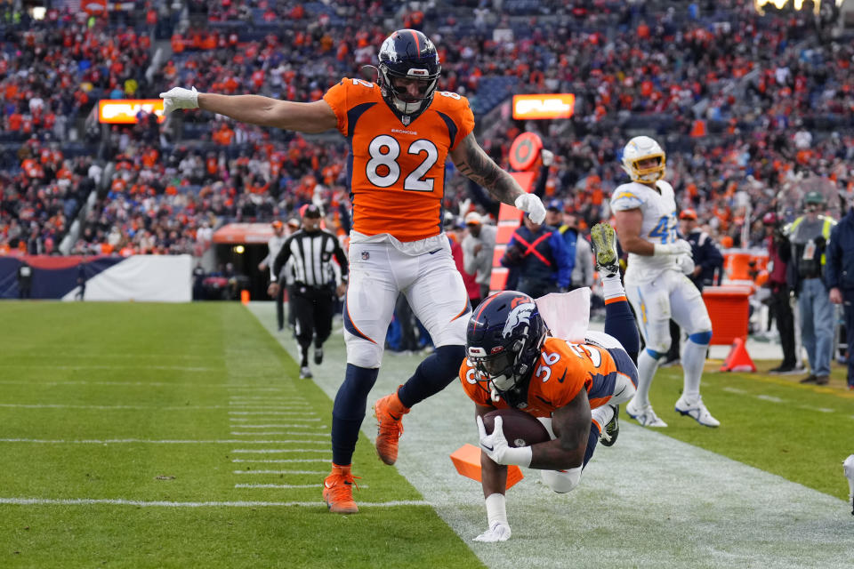 Denver Broncos running back Tyler Badie (36) dives for a touchdown against the Los Angeles Chargers during the second half of an NFL football game in Denver, Sunday, Jan. 8, 2023. (AP Photo/Jack Dempsey)