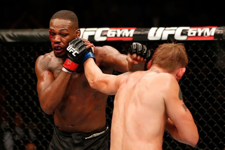 Jon Jones, left, battles Alexander Gustafsson at UFC 165. (Getty Images)