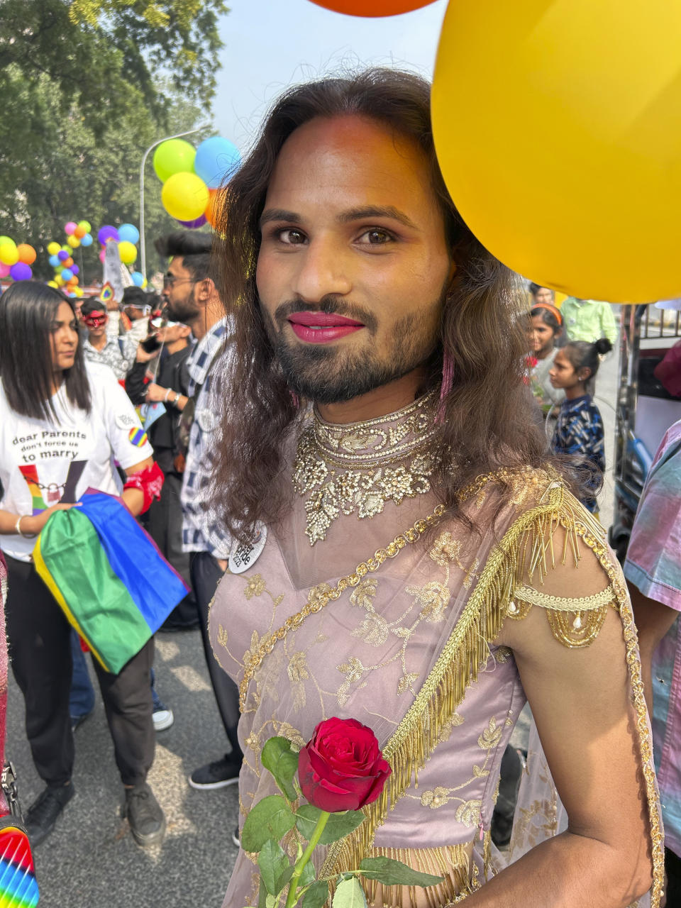 A participant of the Delhi Queer Pride Parade poses for a photograph during the march in New Delhi, India, Sunday, Nov. 26, 2023. This annual event comes as India's top court refused to legalize same-sex marriages in an October ruling that disappointed campaigners for LGBTQ+ rights in the world's most populous country. (AP Photo/Shonal Ganguly)