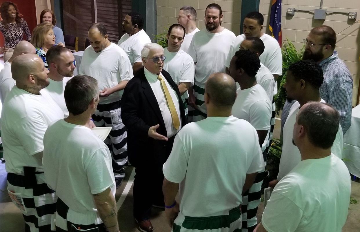 Mississippi Corrections Commissioner Burl Cain talks to inmates following the first graduation on April 1, 2022, of the new comprehensive Betty Ford-type alcohol and drug treatment program at the Walnut Grove Correctional Facility in Leake County.