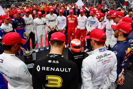 Formula One F1 - Monaco Grand Prix - Circuit de Monaco, Monte Carlo, Monaco - May 26, 2019 Formula One drivers during a minute's silence in tribute to late Formula One legend Niki Lauda Andrej Isakovic/Pool via REUTERS