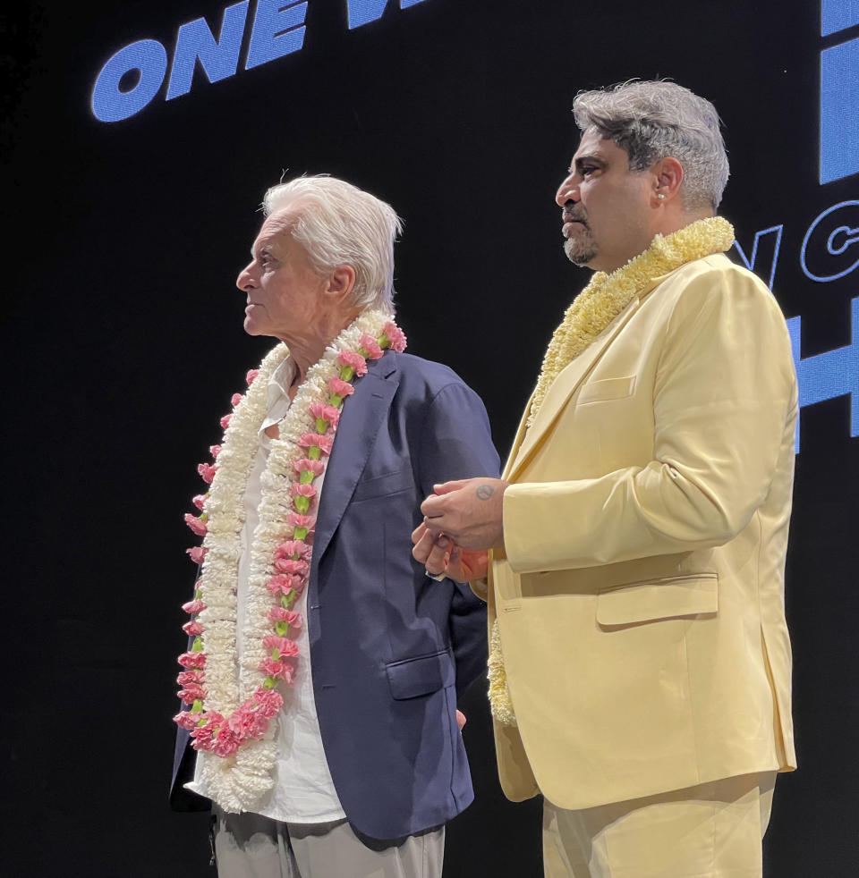Hollywood actor and producer Michael Douglas and Indian film producer Shailendra Singh at a session on the last day of the 54th International Film Festival of India, in Goa, India, Tuesday, Nov. 28, 2023. Douglas was honoured with the Satyajit Ray Lifetime Achievement Award at the festival. (AP Photo/Vineeta Deepak)