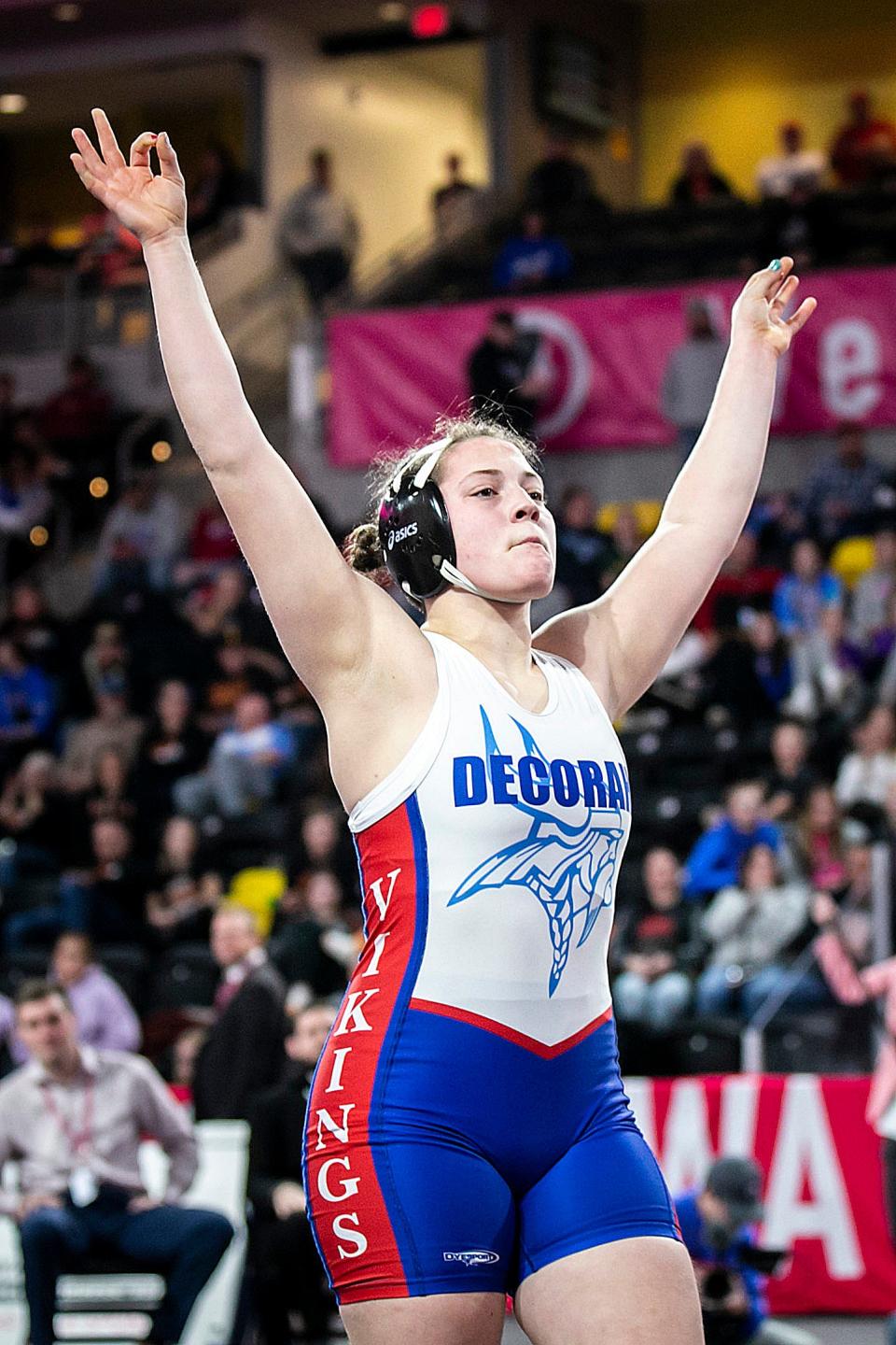 Decorah's Naomi Simon celebrates after scoring a fall at 170 pounds in the finals during the IGHSAU state girls wrestling tournament, Friday, Feb. 3, 2023, at the Xtream Arena in Coralville, Iowa.