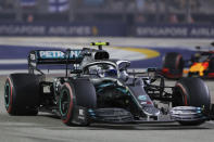 Mercedes driver Valtteri Bottas of Finland steers his car during the Singapore Formula One Grand Prix, at the Marina Bay City Circuit in Singapore, Sunday, Sept. 22, 2019. (AP Photo/Vincent Thian)