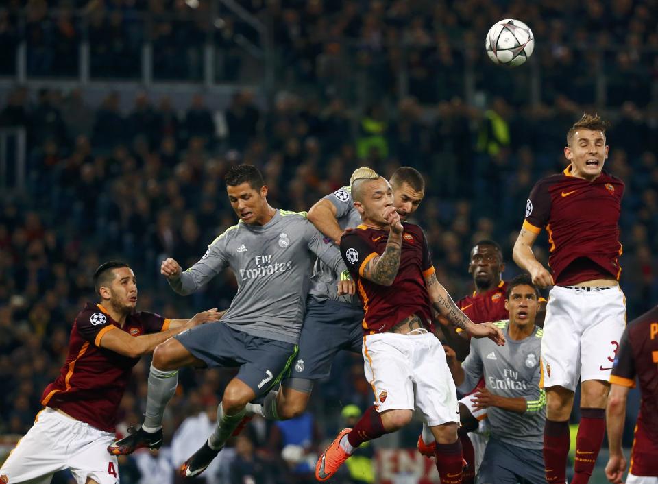 Football Soccer - AS Roma v Real Madrid - UEFA Champions League Round of 16 First Leg - Olympic stadium, Rome, Italy - 17/2/16 AS Roma's Lucas Digne (R) in action during the match against Real Madrid. REUTERS/Tony Gentile
