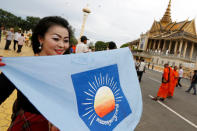 A supporter of opposition Cambodia National Rescue Party (CNRP) takes part in a march to deliver a petition to the parliament and King Norodom Sihamoni to intervene in ther country's current political crisis in Phnom Penh, Cambodia May 30, 2016. REUTERS/Samrang Pring