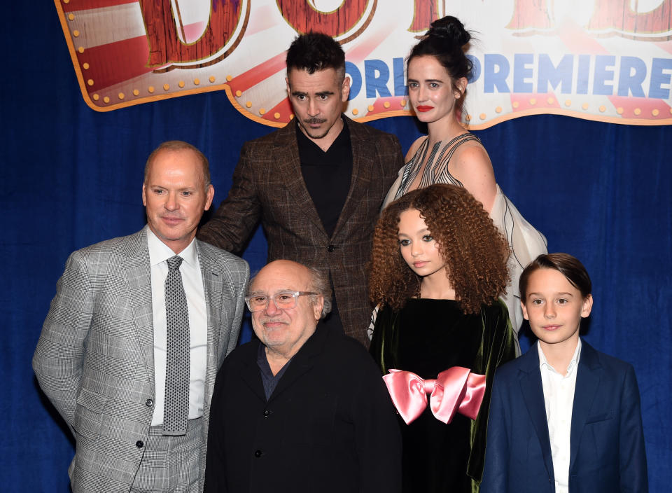(L-R) Michael Keaton, Danny DeVito, Colin Farrell, Nico Parker, Eva Green, and Finley Hobbins attend the premiere of Disney&#39;s 
