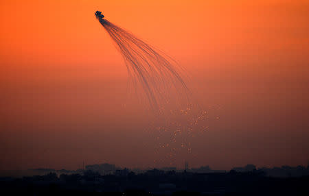 FILE PHOTO: A weapons system fired by Israeli forces explodes over the northern Gaza Strip, January 10, 2009. REUTERS/Yannis Behrakis/File photo