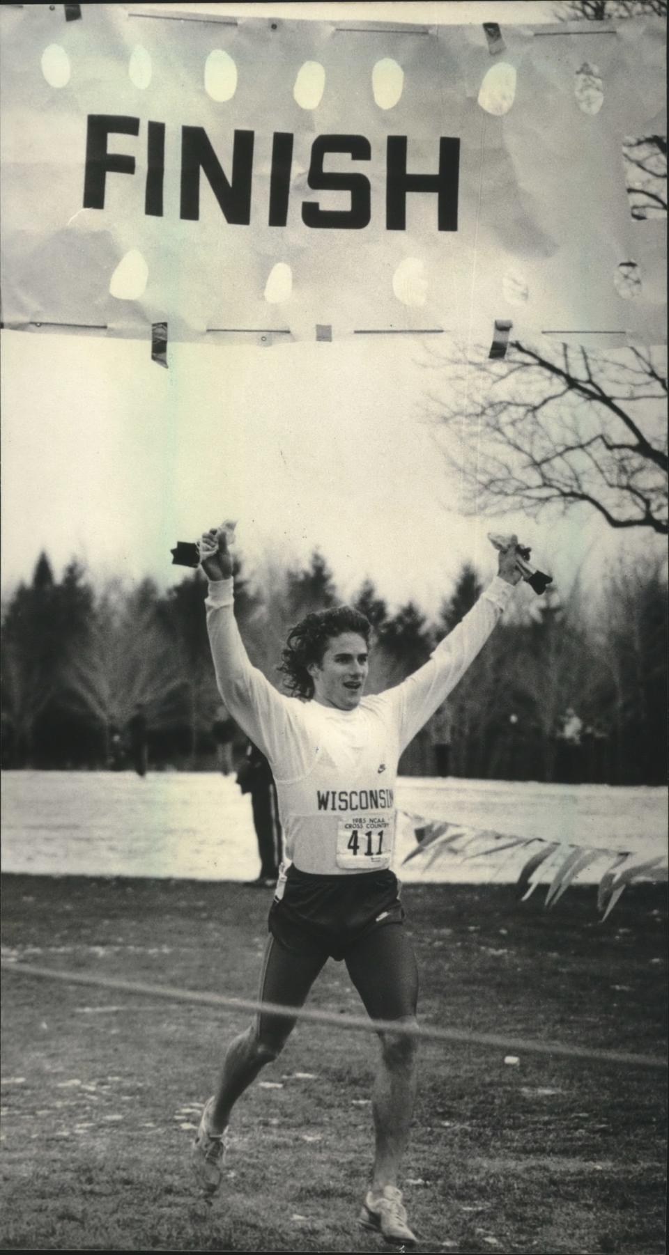 Tim Hacker of the University of Wisconsin celebrated while crossing the finish line in 1985 to win the NCAA cross country men's championship at Dretzka Park, helping the Badgers win the team title that year, as well.