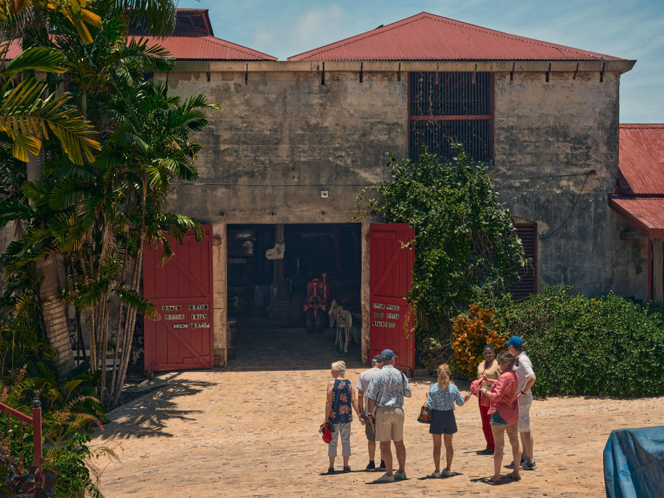 Tourists outside of the St. Nicholas Abbey and Steam Railway in Barbados.<span class="copyright">Christopher Gregory-Rivera for TIME</span>
