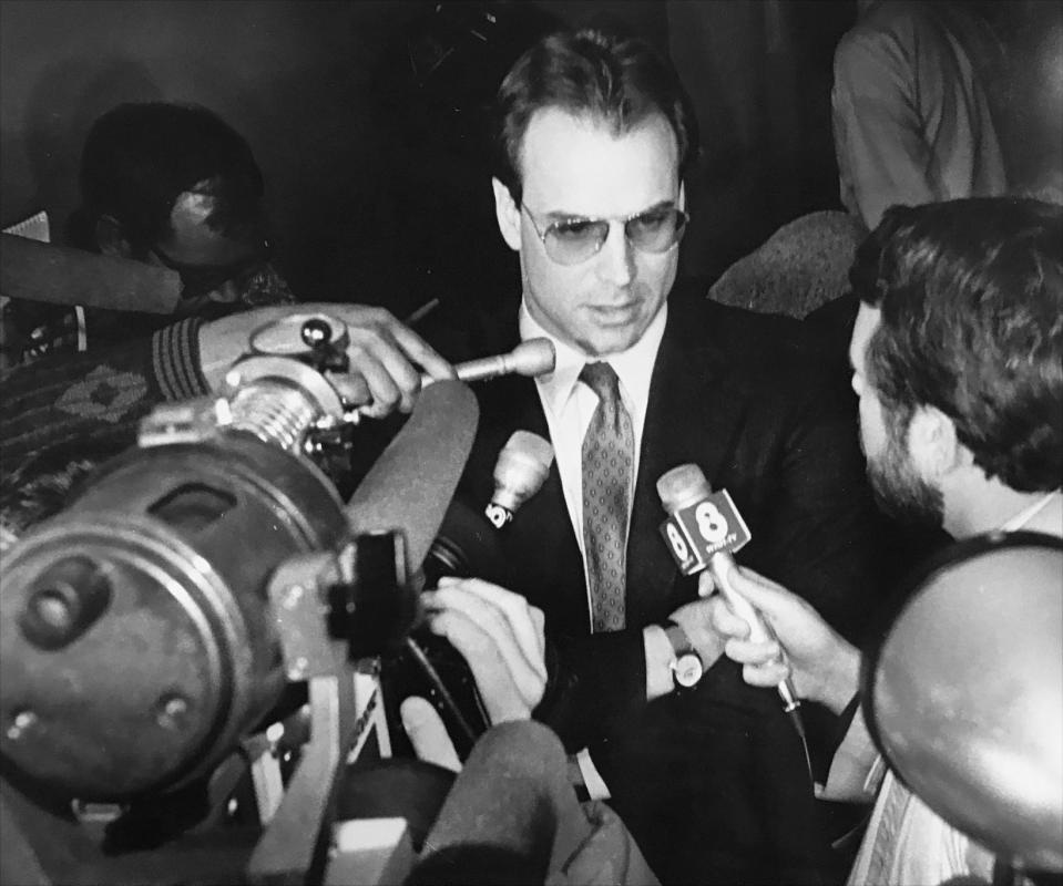 Former Indianapolis Colts player Art Schlichter and his attorney Lesa Lux at the Indianapolis City County building in 1987 after confessing to illegally betting $200,000 on football and basketball games. 