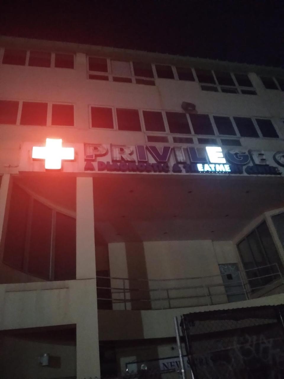 A treatment center with all letters burnt out except the ones that spell 