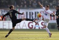 Football Soccer - Carpi v Juventus - Braglia stadium, Modena, Italy- 20/12/15 - Juventus' Claudio Marchisio in action against Gaetano Letizia of Carpi. REUTERS/Alessandro Garofalo