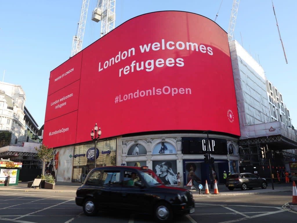 A messaging campaign welcoming refugees launched in Piccadilly Circus on Tuesday  (City Hall)