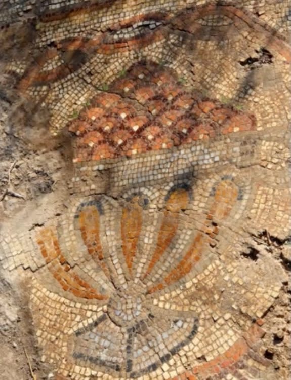 The Byzantine mosaic also shows birds, animals and red fruit in a goblet.