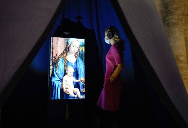 A screen featuring a digital image of Jan Gossaert’s Adoration Of the Kings (Andrew Matthews/PA)