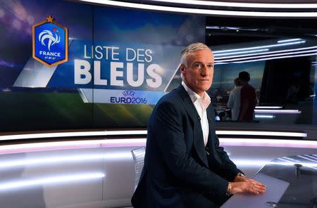 France's soccer head coach Didier Deschamps poses before taking part in the broadcast news of French TV channel TF1 in Boulogne-Billancourt, outside Paris, France, May 12, 2016 to name his 23-man squad for the European soccer Championship in France. REUTERS/Franck Fife/Pool