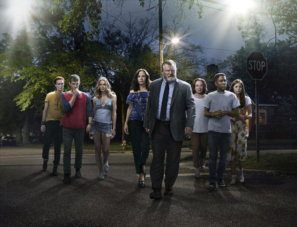 This image released by Peacock shows, from left, Breeda Wool, Harry Treadaway, Kelly Lynch, Mary-Louise Parker, Brendan Gleeson, Holland Taylor, Jharrel Jerome and Justine Lupe from the series "Mr. Mercedes," based on a Stephen King trilogy. The first two seasons of “Mr. Mercedes” will be bingeable on Peacock starting on Oct. 15. (Photo by: Sonar Entertainment/Peacock)