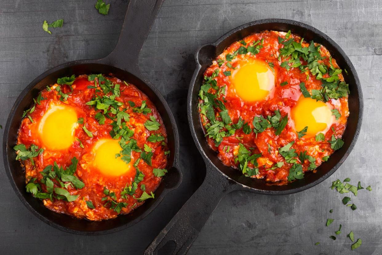 fried eggs with tomato and pepper sauce, shakshuka