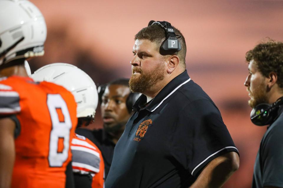 The Lely Trojans compete against the Estero Wildcats in a spring football game at Lely High School in Naples on Friday, May 19, 2023.