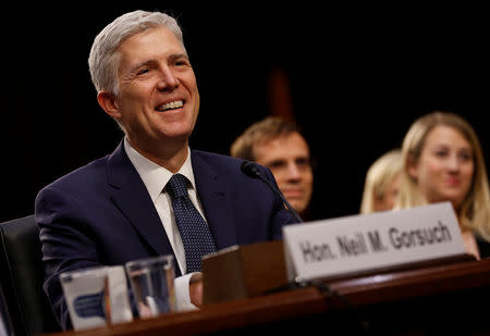 FILE PHOTO: U.S. Supreme Court nominee judge Neil Gorsuch testifies during the third day of his Senate Judiciary Committee confirmation hearing on Capitol Hill in Washington, U.S. on March 22, 2017. REUTERS/Jonathan Ernst/File Photo