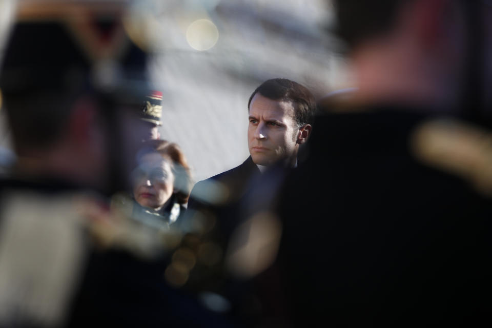 French President Emmanuel Macron arrives to deliver a speech at the Ecole Militaire Friday, Feb. 7, 2020 in Paris. French President Emmanuel Macron, who leads the European Union's only post-Brexit nuclear power, on Friday advocated a more coordinated EU defense strategy in which France, and its arsenal, would hold a central role. (AP Photo/Francois Mori)