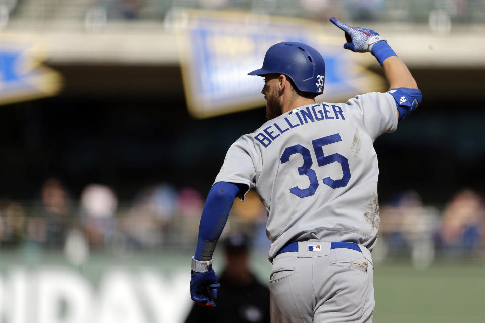 Los Angeles Dodgers' Cody Bellinger reacts after hitting a home run during the ninth inning of a baseball game against the Milwaukee Brewers Sunday, April 21, 2019, in Milwaukee. (AP Photo/Aaron Gash)