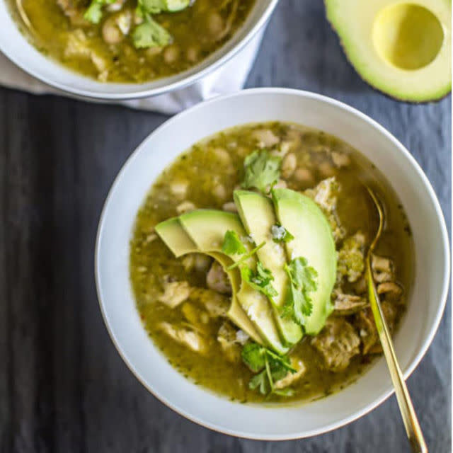 <p>In just 15 minutes, you can whip up a seriously hearty and nutrient-packed chicken soup that'll taste like it's been simmering on the stove all day long. </p><p><strong>Get the recipe at <a rel="nofollow noopener" href="http://rootandrevel.com/easy-salsa-verde-chicken-soup/ " target="_blank" data-ylk="slk:Root + Revel;elm:context_link;itc:0;sec:content-canvas" class="link ">Root + Revel</a>.</strong></p>