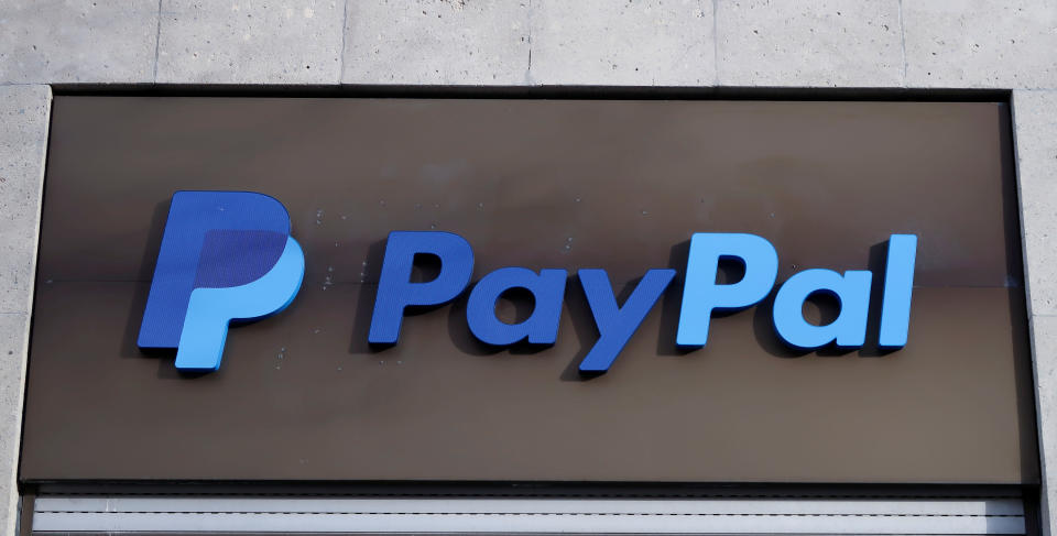 The PayPal logo is seen at an office building in Berlin, Germany, March 5, 2019.   REUTERS/Fabrizio Bensch