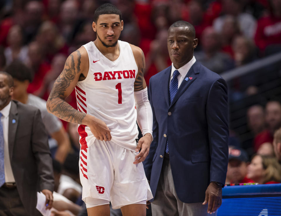 Dayton's Obi Toppin and coach Anthony Grant look on during a game against Fordham on Feb. 1. (Michael Hickey/Getty Images)