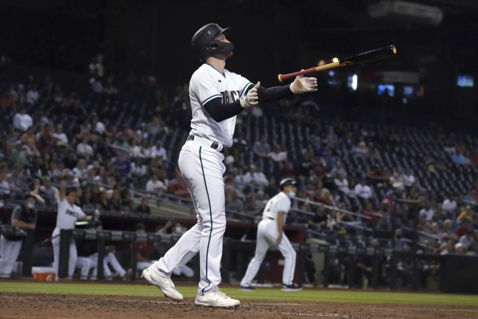 Arizona Diamondbacks' Pavin Smith watches his three-run home run against the New York Mets during the sixth inning during a baseball game Tuesday, June 1, 2021, in Phoenix. (AP Photo/Rick Scuteri)