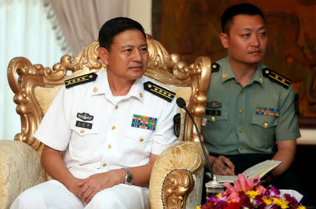 Captain Wang Hong Li (L), Commanding Officer of the 23rd Chinese Naval Escort Task Force, attends a meeting with Cambodia's Defense Minister Tea Banh, at the Ministry of National Defense of Cambodia, in Phnom Penh, Cambodia October 17, 2016. REUTERS/Samrang Pring