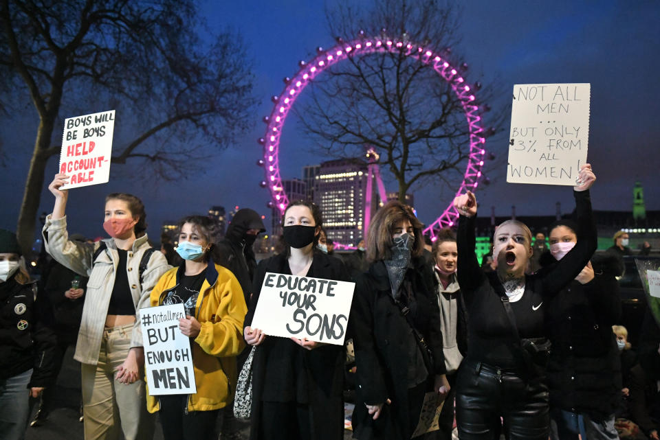 Protesters outside New Scotland Yard in central London.