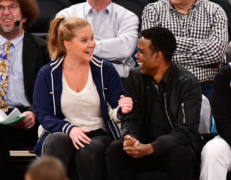 <p>The newly married funny lady shared some laughs with her pal (and probably dished some wedding details) courtside as the New York Knicks took on the Golden State Warriors at Madison Square Garden on Monday in NYC. (Photo: James Devaney/Getty Images) </p>