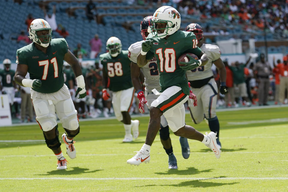 Florida A&M wide receiver Jah'Marae Sheread (10) runs to score a touchdown during the first half of the Orange Blossom Classic NCAA college football game, Sunday, Sept. 3, 2023, in Miami Gardens, Fla. (AP Photo/Lynne Sladky)