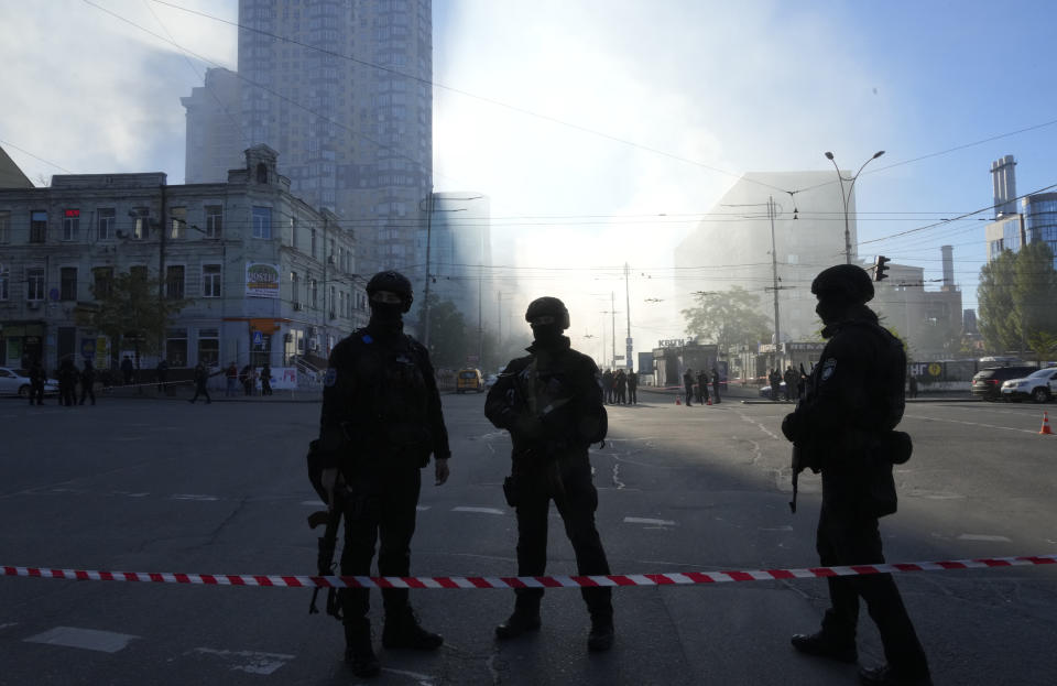 Police block a square after a drone fired on buildings in Kyiv, Ukraine, Monday, Oct. 17, 2022. (AP Photo/Efrem Lukatsky)