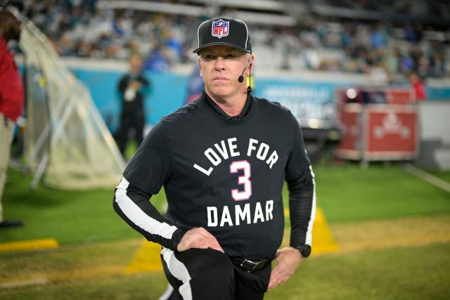 Minnesota Vikings wide receiver Justin Jefferson wears a shirt honoring  injured Buffalo Bills player Damar Hamlin before an NFL football game  against the Chicago Bears, Sunday, Jan. 8, 2023, in Chicago. (AP