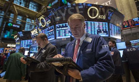 Traders work on the floor of the New York Stock Exchange, October 17, 2013. REUTERS/Brendan McDermid