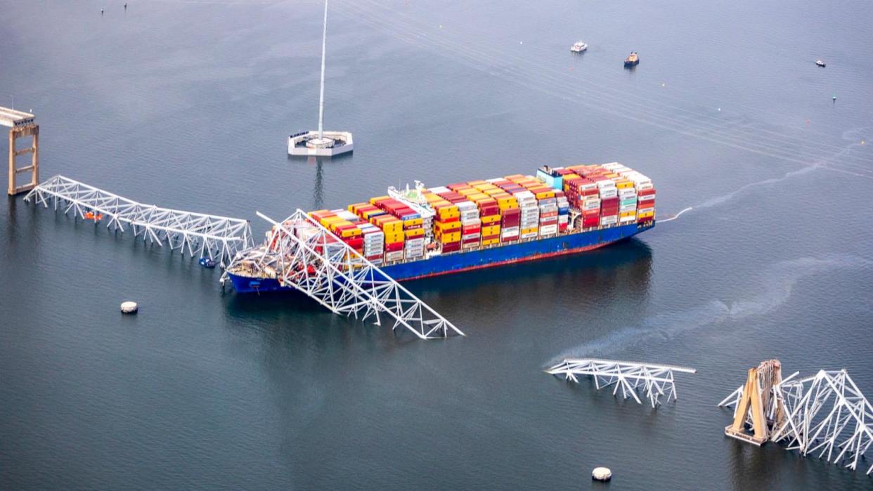 PHOTO: In an aerial view, cargo ship Dali is seen after running into and collapsing the Francis Scott Key Bridge, Mar. 26, 2024 in Baltimore. (Tasos Katopodis/Getty Images)