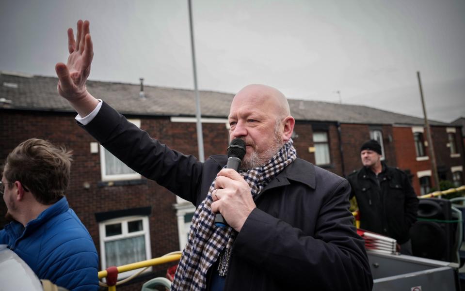 Simon Danczuk, the Reform UK candidate in the Rochdale by-election, is pictured campaigning on an open top bus in Rochdale today