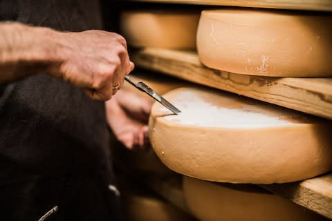 Taking a sample of Comté - Credit: GETTY